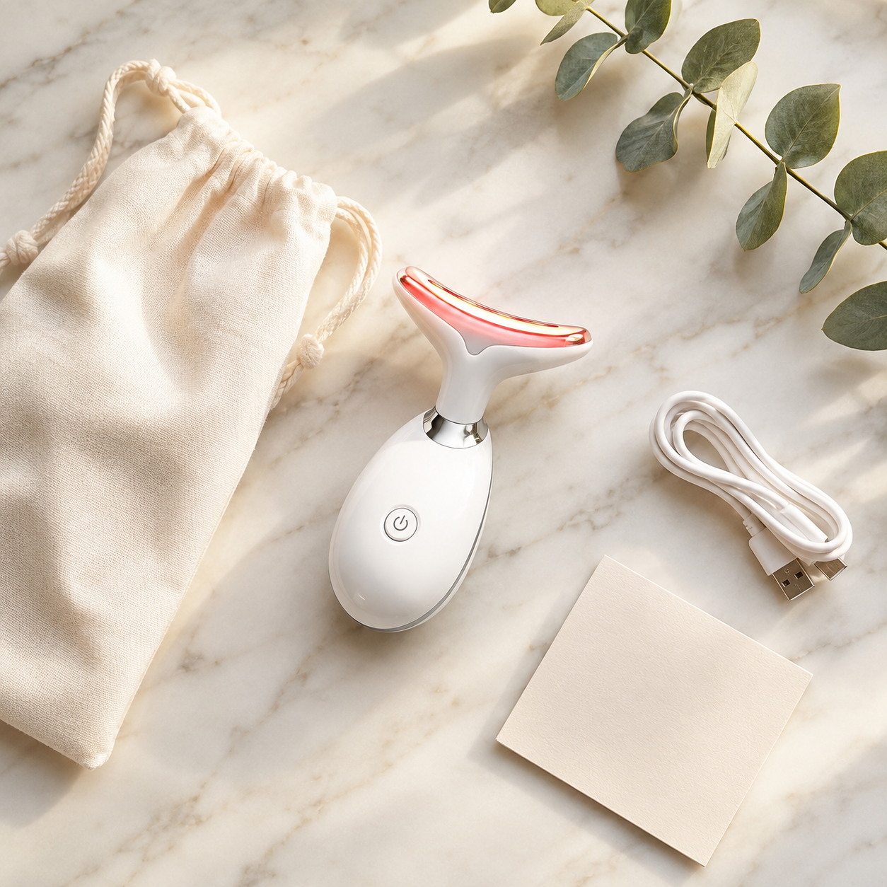 Everything included with the LumiCurve device in a marble flat lay